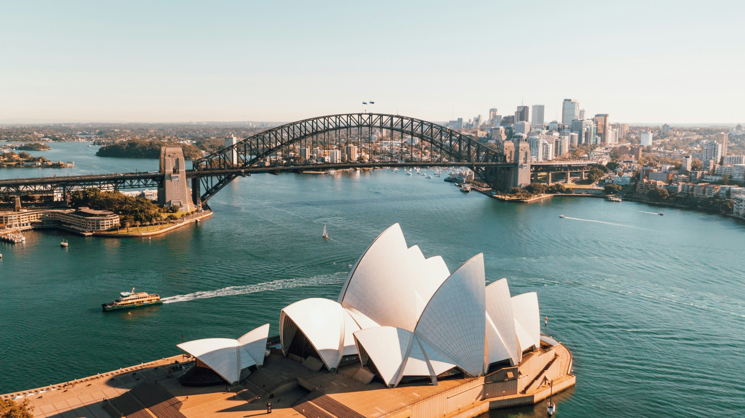 Sydney Opera House beside Sydney Harbour